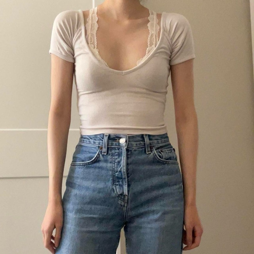Urban Outfitters out from under beige v-neck top